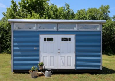 10x16 Modern Building Ocean Blue with Light Gray Trim. 6’ 4 Lite Double Door