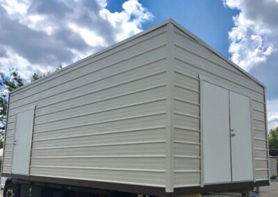 Custom 12x24 Slant Shed Building. Light Stone with Light Stone Trim. 6’ Double Door, 4’ Door and Two Windows.